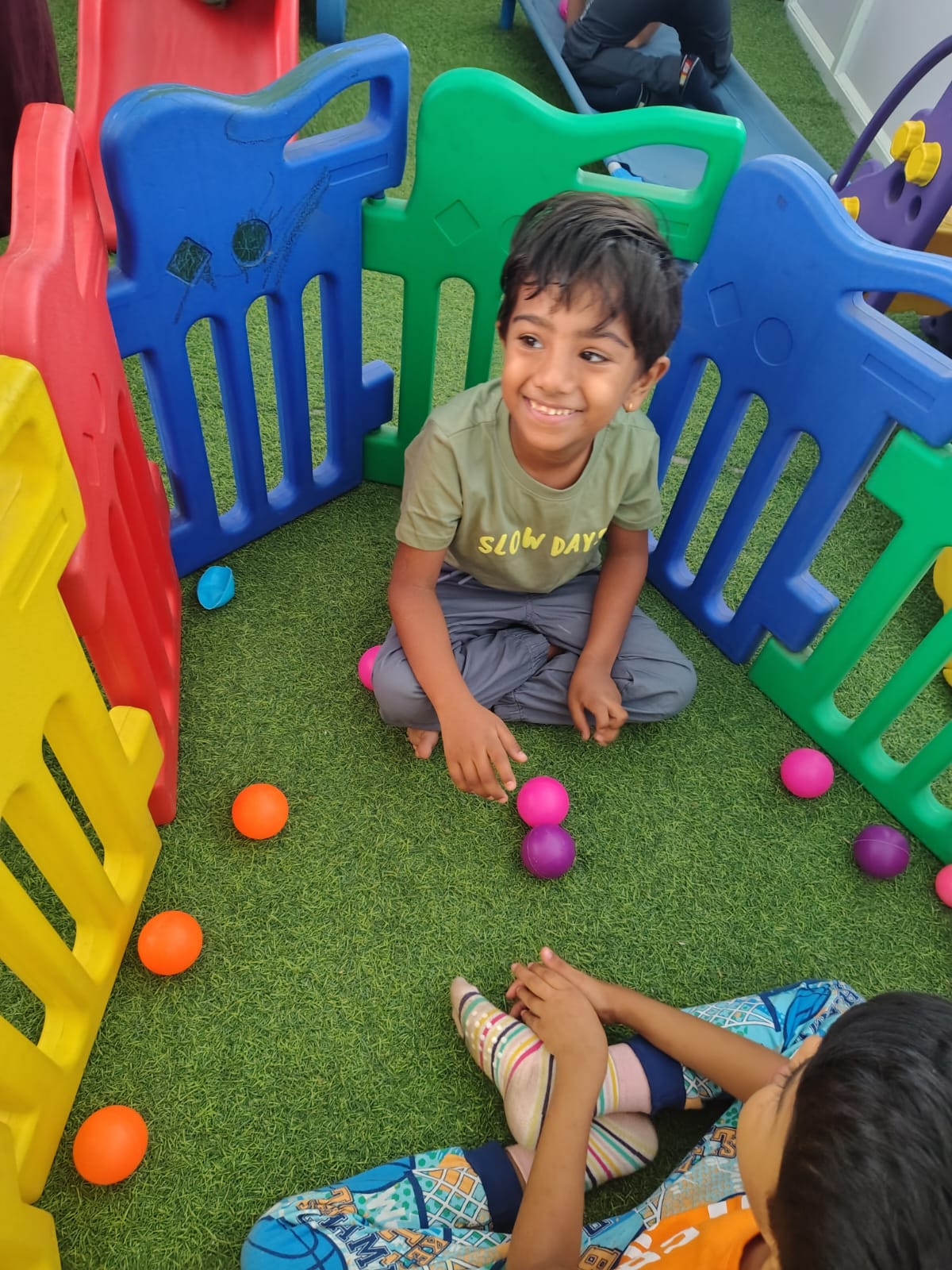 Children playing together in the sensory-friendly space at Aavishkaar